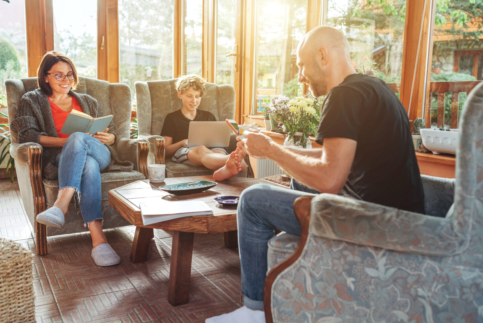 family using a newly insulated three-season room without worrying about wasted heat or becoming uncomfortable